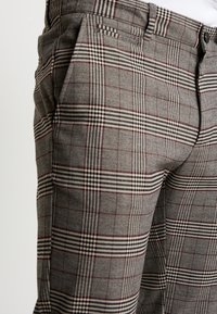 Pier One Trousers - mottled brown