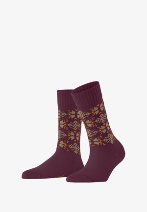 Bordeaux sokken met een patroonontwerp in beige en oranje accenten. Geribbelde boord, gladde textuur en contoured vorm voor een goede pasvorm.