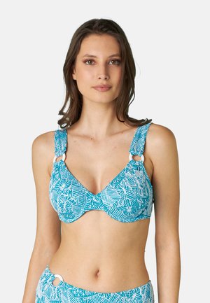 Top di bikini turchese con motivo, dalle spalline larghe, coppe sagomate e dettagli metallici circolari. Il materiale ha una consistenza liscia e leggermente lucida.