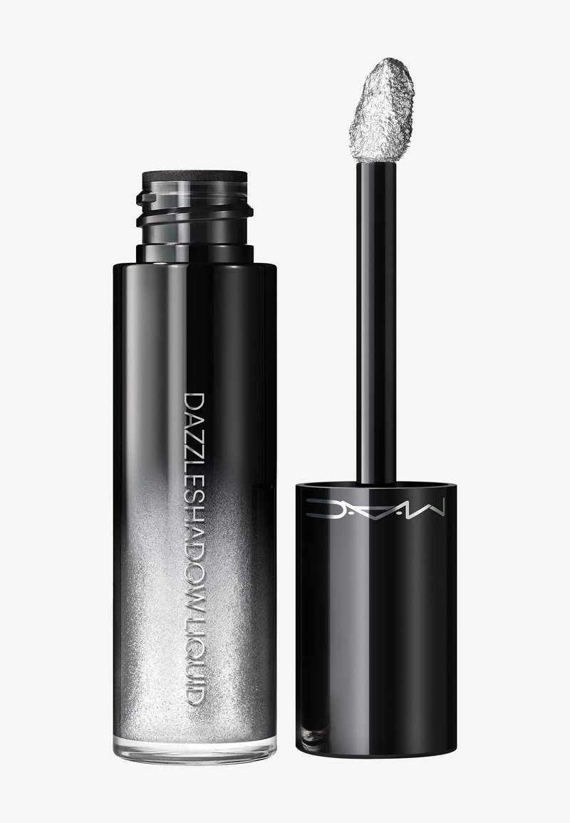 Svart och silver MAC Dazzleshadow Liquid ögonskuggeflaska med appliceringspensel täckt av glittrande silverglitter.