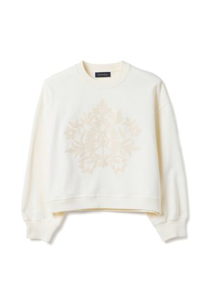Cream long-sleeve sweatshirt with ribbed cuffs and hem, featuring a subtle raised floral embroidery on the front center.