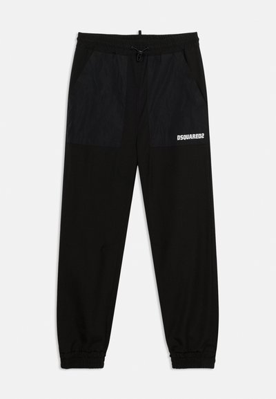 Pantalon de jogging noir avec poignets et taille élastiques, doté de grandes poches avant avec cordon de serrage et logo blanc "DSQUARED2" sur la poche droite.