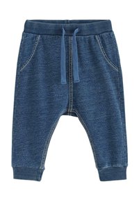 Joggingbyxor i jeanstil i mörkblått, med ribbad midja och muddar, justerbar dragsko och två sidofickor med kontrasterande sömmar.