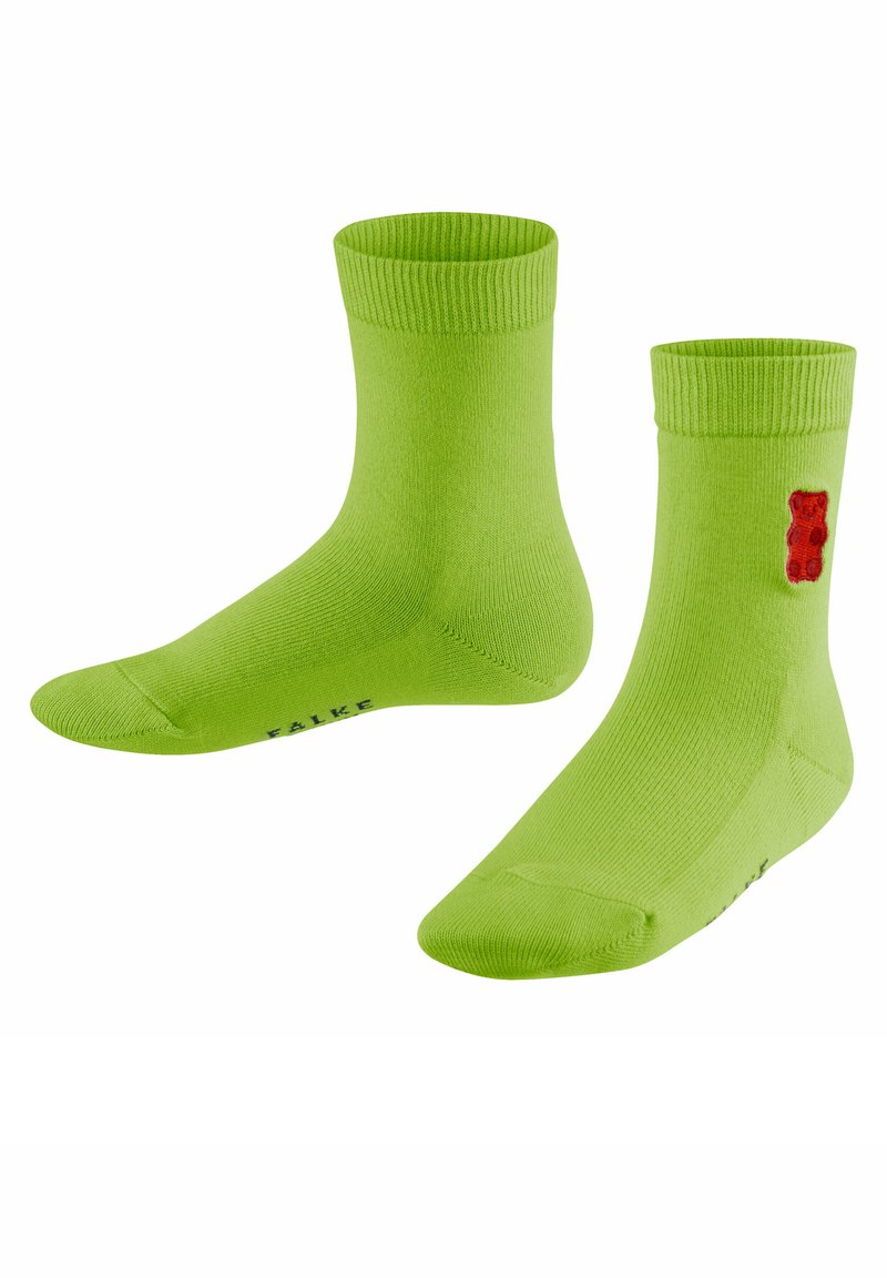 Grüne Baumwollsocken mit einem gerippten Bund, der ein rotes Gummibärchen-Motiv zeigt. Die Socken haben eine glatte Textur und eine Standard-Crew-Länge.