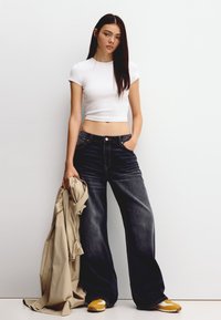 Bershka Flared Jeans - black