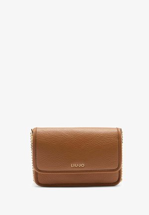 Brown textured leather crossbody bag with gold-tone chain accents and a front flap closure, featuring branding on the lower front.