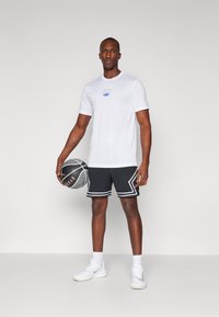 Nike Performance - Koszulka sportowa