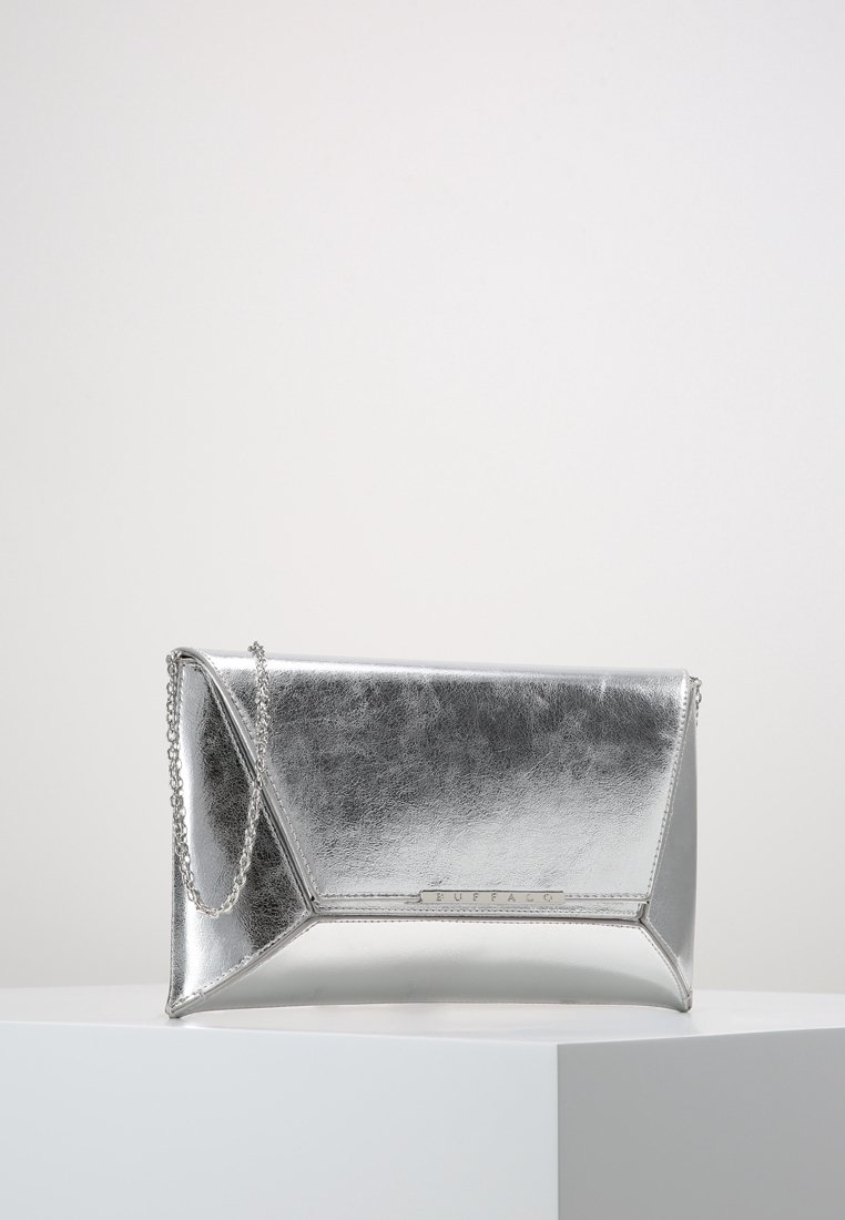 Metallic silver clutch bag with a geometric shape, smooth texture, and a detachable chain strap. Features a brand logo on the front.