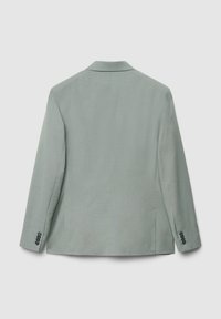Hellgrauer Blazer mit Reverskragen, einzelnem Schlitz und vier Knöpfen an den Ärmelabschlüssen. Glatter Stoff mit minimalistischem Design und maßgeschneiderter Passform.