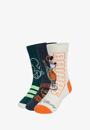 Three pairs of socks: navy blue with green stripes, dark green with a character graphic, and cream with orange accents and "ADIDAS" text.