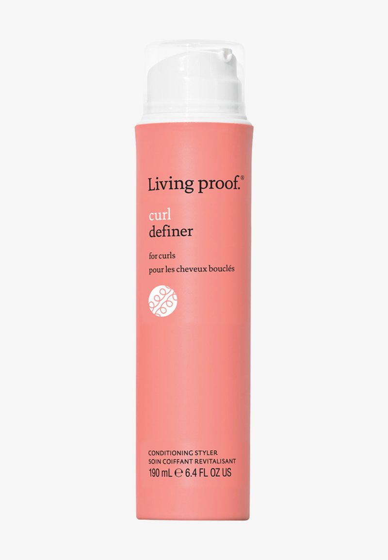 Living Proof Curl Definer conditioning styler for curls, 190 ml bottle with white pump dispenser, coral-colored packaging.
