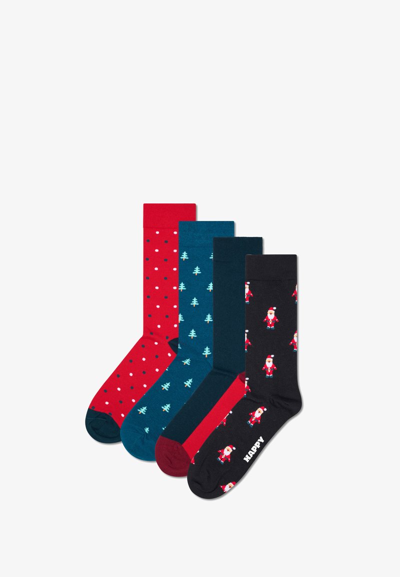 Sæt af fire knæhøje strømper: røde med hvide prikker, teal med grønne træer, mørk teal og sorte med julemandsdesigns. Fabrik af bomuldsblanding.