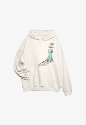 Off-white hættetrøje med frontlomme med Minecraft Creeper-grafik og teksten "Survival Mode Adventure Is An Attitude" på brystet og ærmet.