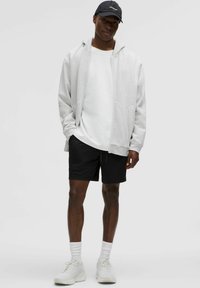 lululemon DOUBLE-LAYERED MESH LINERLESS 18CM - Kurze Sporthose - black black black