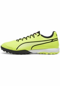 Scarpa sportiva verde lime con tomaia testurizzata, dettagli neri, decorazioni laterali a fantasia e suola in gomma nera progettata per una migliore aderenza.