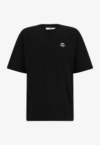 Camiseta de algodón negra con un corte relajado. Presenta mangas cortas y un logo impreso en blanco en el lado izquierdo del pecho, diseño minimalista.
