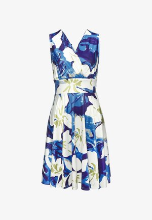 Robe à motifs floraux avec un col en V et un design sans manches. Comprend une taille cintrée en blanc avec des accents floraux bleus et verts.