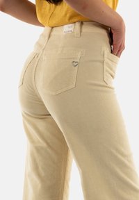 PLEASE Pantaloni - beige