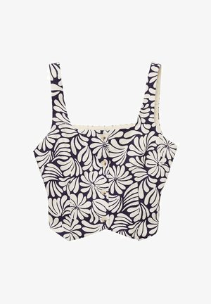 Dopasowany crop top z szerokimi ramiączkami, granatowy materiał w białe liście, z przodu zapięcie na guziki oraz kontrastowe wykończenie na brzegach.