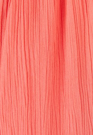 Pleated coral fabric showcasing vertical ridges, slightly textured surface, lightweight material for fluid movement.
