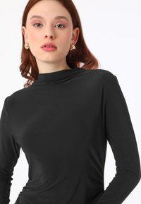 Modanisa REFKA - Maxikjoler - black