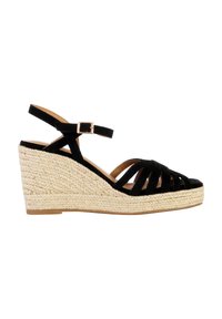 Sandalo a zeppa in suede nero con base in juta intrecciata, dotato di cinturini incrociati e fibbia alla caviglia. Parte superiore testurizzata e suola liscia.