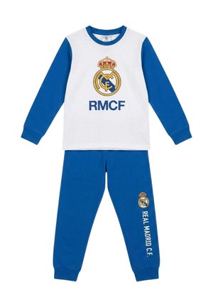 Zweiteiliges Real Madrid C.F. Kinder-Outfit mit langärmligem weiß-blauem Oberteil, blauen Hosen und Vereinslogos auf Brust und Bein.