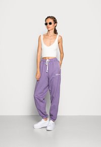 Ellesse VELAM - Calças de fato de treino - purple