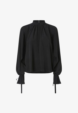 Blusa nera con maniche lunghe a sbuffo, colletto alto e dettagli arricciati. Presenta chiusure con lacci ai polsini e una zip discreta sul retro. Tessuto morbido.