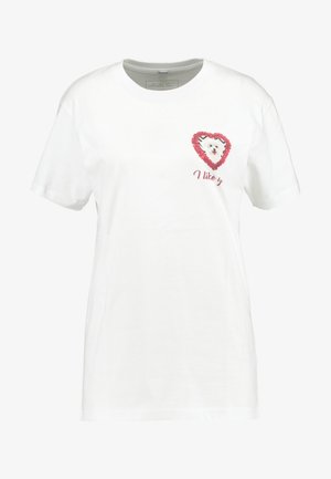 Tricou alb din bumbac, cu mâneci scurte, având un design cu inimă roșie și o ilustrație cu un câine, cu textul "Îmi place y" sub grafic.