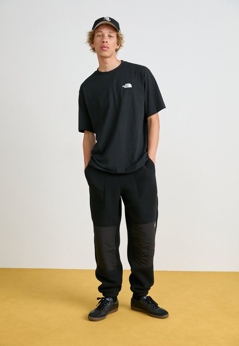 The North Face M RETRO DENALI PANT - Teplákové kalhoty - black