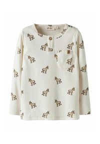 Koszula z długim rękawem w kolorze kremowym, z zapięciem na guziki przy szyi; ozdobiona powtarzającym się nadrukiem osła i małą kieszonką, wykonana z miękkiego materiału.