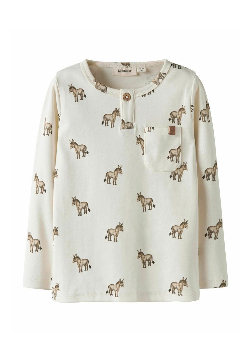 Koszula z długim rękawem w kolorze kremowym, z zapięciem na guziki przy szyi; ozdobiona powtarzającym się nadrukiem osła i małą kieszonką, wykonana z miękkiego materiału.