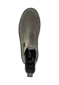 Suede ankle boot in olive green, featuring pull tabs, elastic side panels, and a cushioned interior. Black rubber sole and lining.