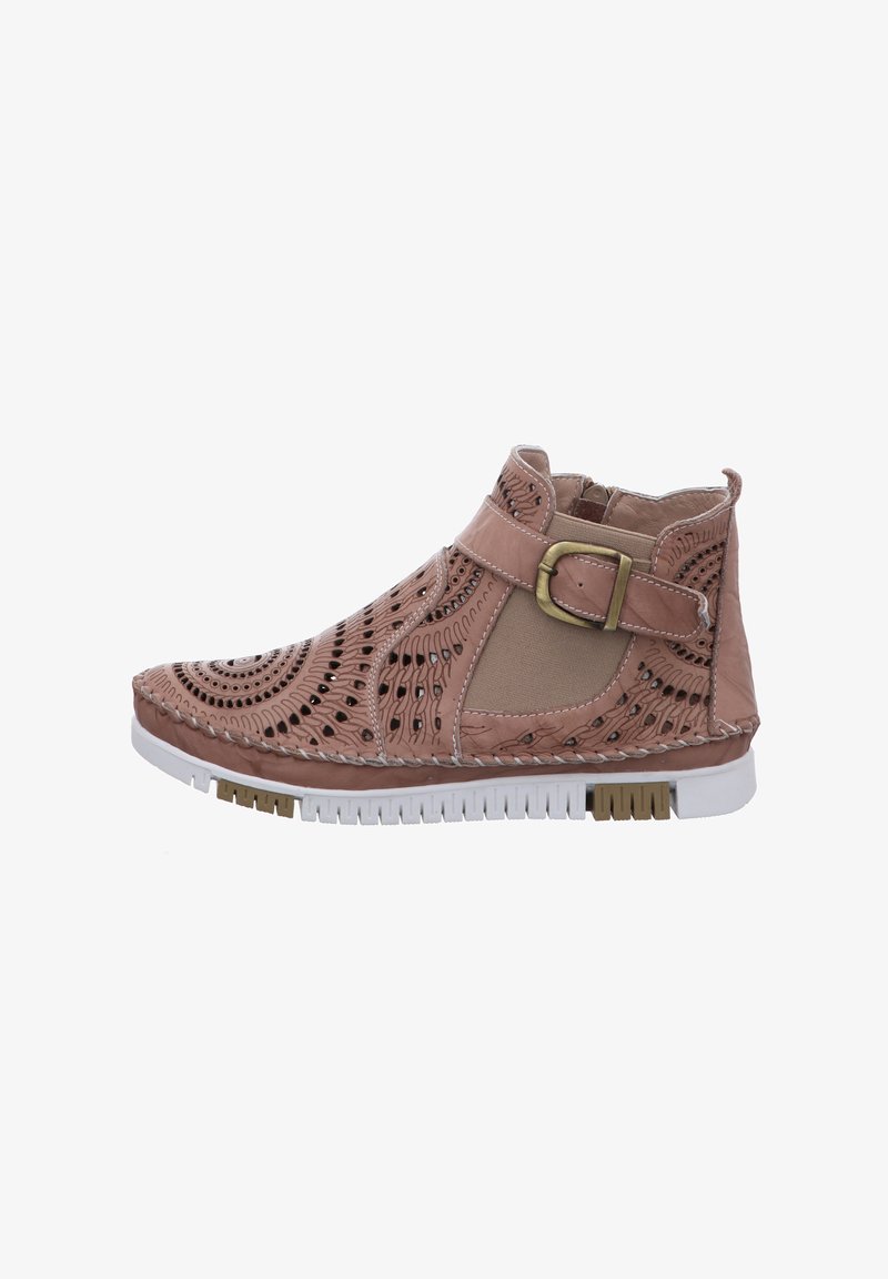 Pink leather ankle boot with cut-out patterns, round toe, and white rubber sole. Features a buckle strap and stitched accents.