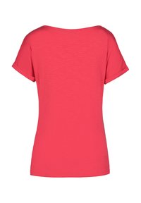 Getailleerd shirt met korte mouwen in fel koraal, gemaakt van zachte stof, met een ronde halslijn en opgerolde mouwtjes. Glad oppervlak, zonder patronen.