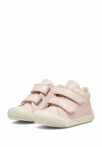 Pink leather shoes with two Velcro straps, white rubber sole, textured toe cap, and embossed branding on the side. Minimalist design.
