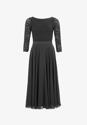 Schwarzes Kleid mit Spitzendetails an den Dreiviertelärmeln, einem taillierten Spitzenoberteil und einem fließenden Chiffonrock, der bis zu den Knöcheln reicht.