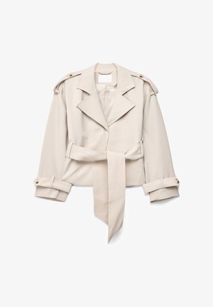 Beige korte trenchcoat met brede revers, geruite schouderepauletten, lange ceintuur met strik en verstelbare manchetten met knopen.