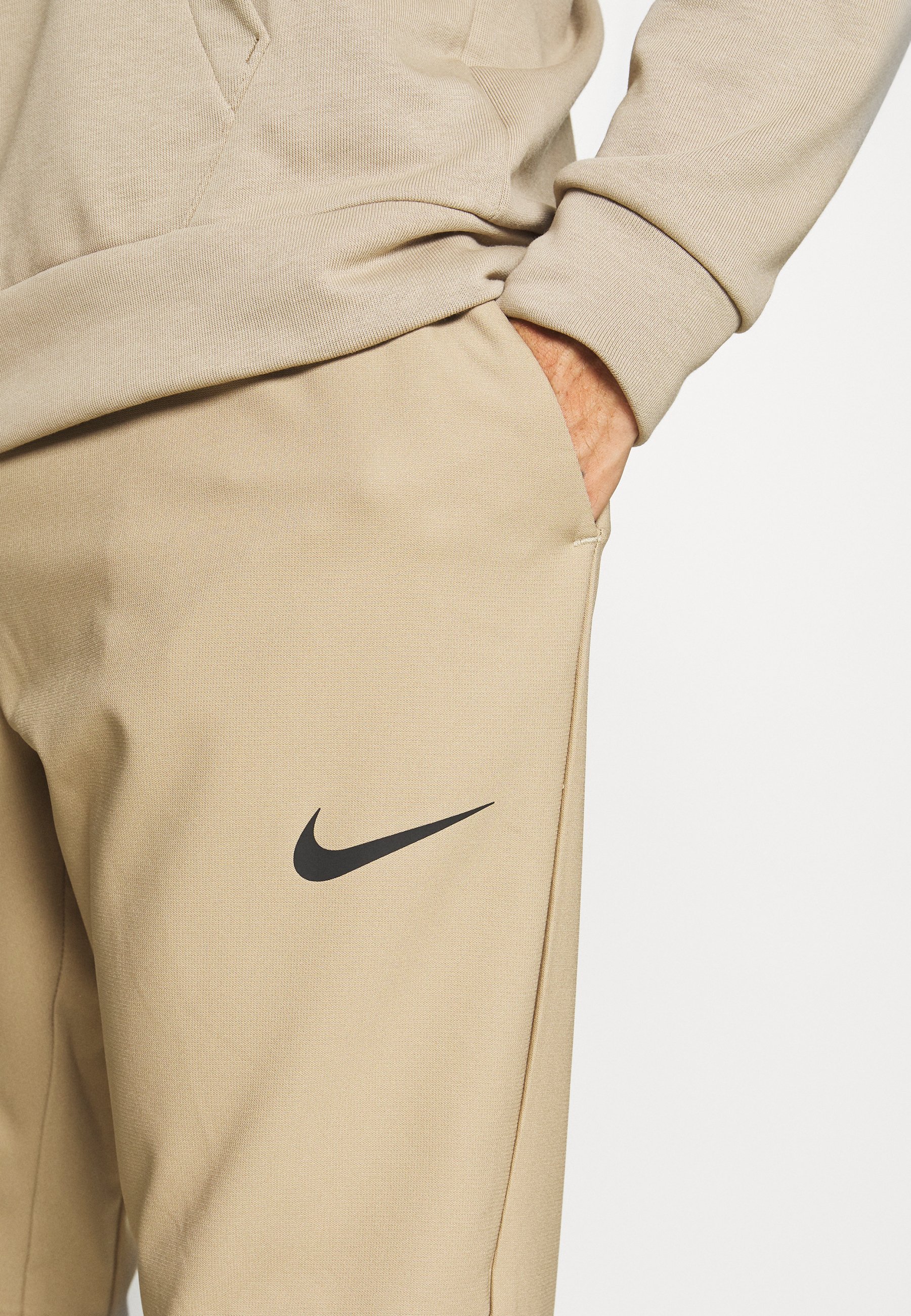 tan nike joggers