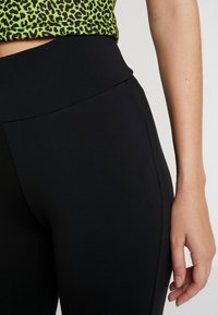 Urban Classics Leggings - Byxor - black