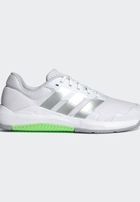 White athletic shoe with a textured upper, metallic three stripes, and a green accent on the sole. Features a padded collar and mesh elements.