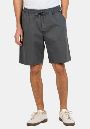 Pantalones cortos de algodón gris con cintura elástica, detalles de cordón y bolsillos laterales. Textura suave y corte recto en el dobladillo.