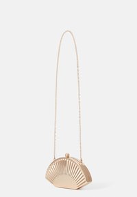 Gold metal clutch purse with a fan shape, featuring ridged detailing and a chain strap. Closure with a small round knob on top.