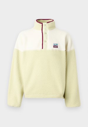 Light green fleece pullover with a white upper section, high collar, and three button closure, featuring a small logo on the chest.