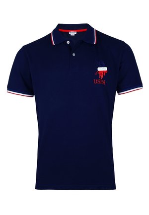 Polo din bumbac de culoare albastru marin, cu margini de guler cu dungi roșii și albe. Logo-ul brodat USPA pe pieptul stâng. Mâneci scurte.