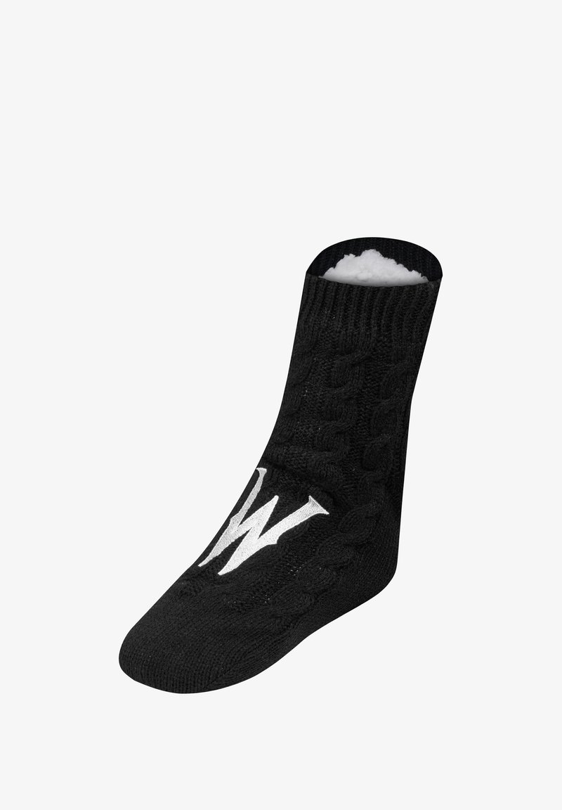 Calcetín negro de punto con un patrón de trenzas, forro de forro polar y logo blanco "W" en el costado; longitud hasta la mitad de la pantorrilla con un diseño de punta redondeada.