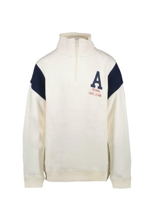 Witte zip-up trui met marineblauwe schouderpanelen, voorzien van een geribde kraag, manchetten en zoom; geborduurd logo op de borst.