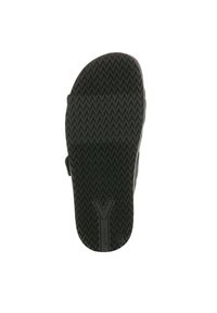 Semelle de sandale en caoutchouc noir avec une texture en zigzag, une forme contournée et un détail de logo en relief. Conçu pour le confort et l'adhérence.