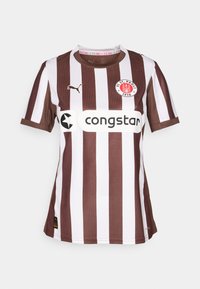 Brown and white striped jersey with short sleeves, crew neck, featuring a logo patch and sponsor text on the front. Made of textured fabric.